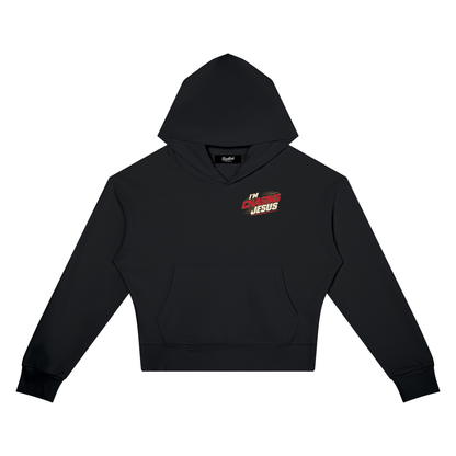 I'm Chasing Jesus Women's Crop Hoodie in Black, front view with the left chest graphic
