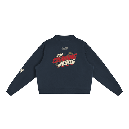I'm Chasing Jesus Women's Mock Neck in Navy, back view with the full varsity red graphic