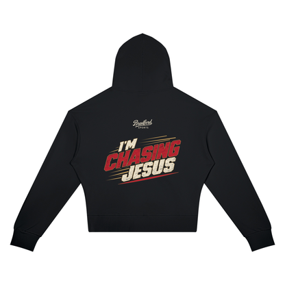 I'm Chasing Jesus Women's Crop Hoodie in Black, back view with the full varsity red graphic