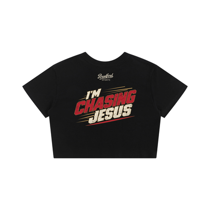 I'm Chasing Jesus Women's Baby Tee in Black, back view with the full varsity red graphic